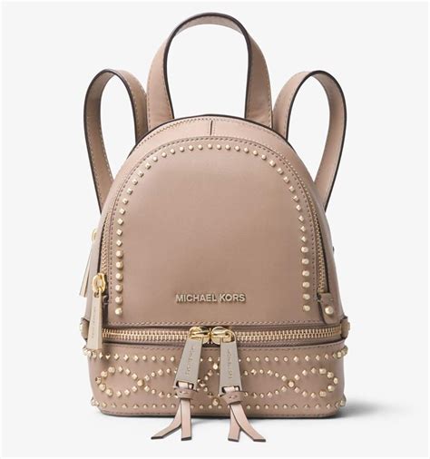 michael kors rucksack braun nieten|Michael Kors brown luggage.